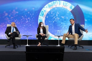 Speakers on the Council's event stage