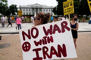 Demonstrators rally outside the White House to protest US military action in Iran