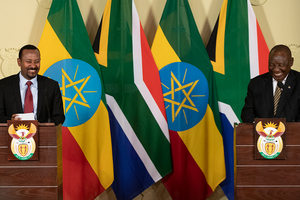 Ethiopia's Prime Minister Abiy Ahmed and South African President Cyril Ramaphosa smile during a joint press conference in Pretoria, South Africa on January 12, 2020.