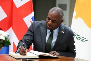 David Lammy signing a note on UK-Cyprus relations on July 4, 2025.