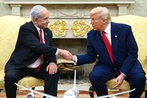 President Donald Trump shakes the hand of Israel's Prime Minister Benjamin Netanyahu in the Oval Office 