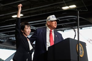 President Donald Trump, with Japanese Prime Minister Sanae Takaichi, speaks to members of the military aboard the USS George Washington, an aircraft carrier docked at an American naval base, in Yokosuka, Tuesday, Oct. 28, 2025. 