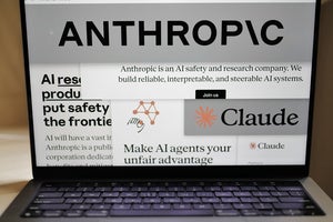 Pages from the Anthropic website and the company's logos are displayed on a computer screen in New York on Thursday, Feb. 26, 2026.
