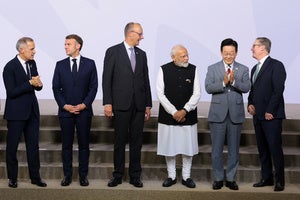 Canada's Prime Minister Mark Carney, France's President Emmanuel Macron, Germany's Chancellor Friedrich Merz, India's Prime Minister Narendra Modi, South Korea's President Lee Jae Myung, and British Prime Minister Keir Starmer stand as leaders pose for a group photo, on the opening day of the G20 Leaders' Summit, in Johannesburg, South Africa, Saturday, Nov. 22, 2025. 