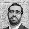 Headshot of Emile Hokayem