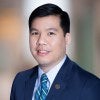 Headshot photograph of Kim H. Tran