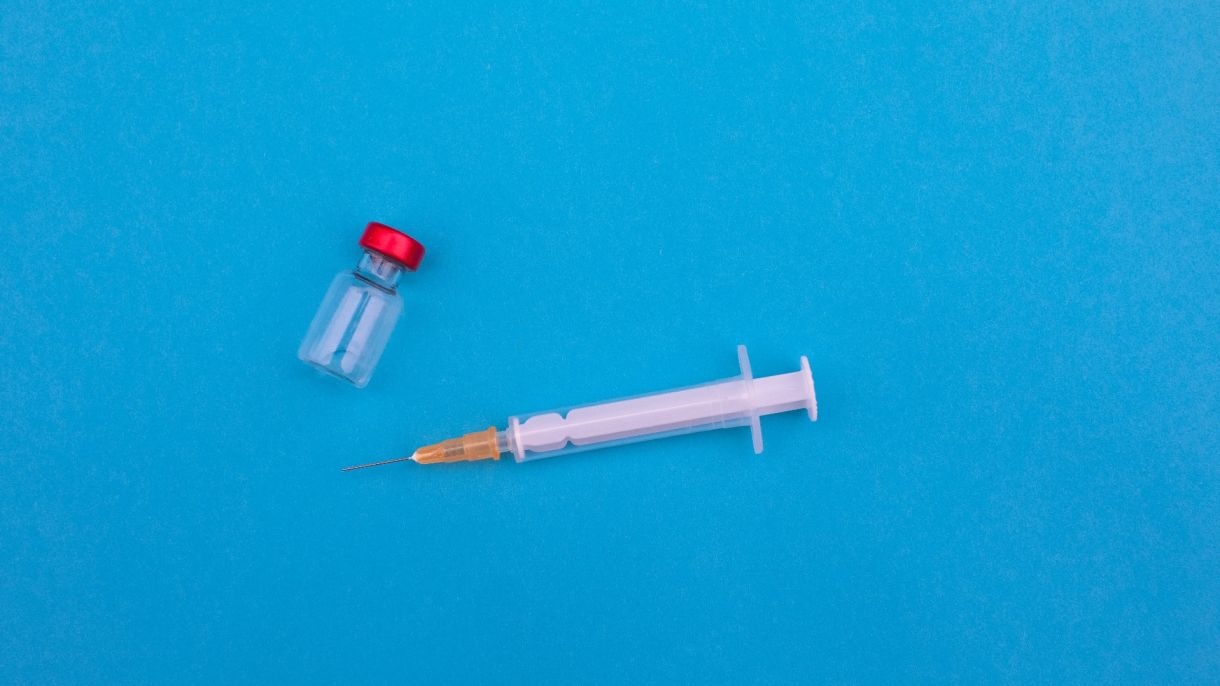 vaccine syringe and bottle