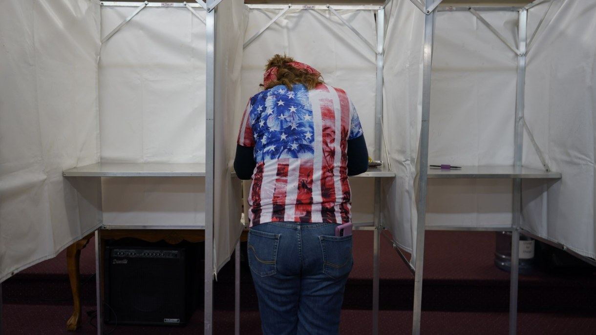 a woman votes in US election