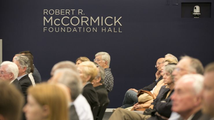 A crowd in the Council conference center