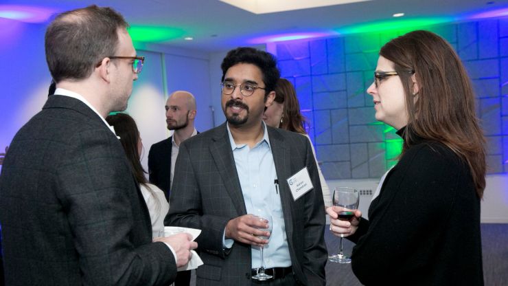 A group of YP Ambassadors talking at an event