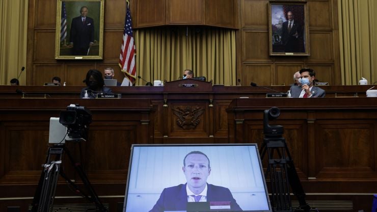 Mark Zuckerberg appears on a video feed testifying before Congress.