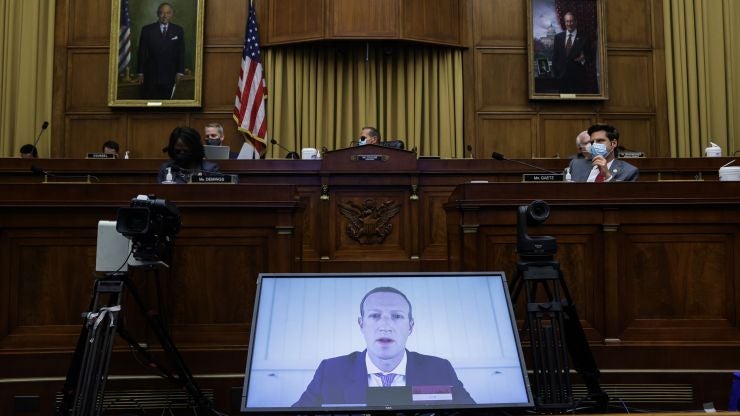 Mark Zuckerberg appears on a video feed testifying before Congress.