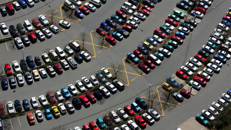 A parking lot full of parked cars