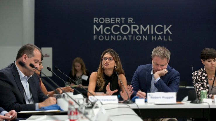 A group of people attending a workshop at the Robert R. McCormick Foundation Hall. 