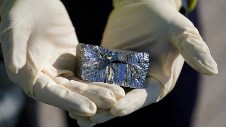 A person holding refined tellurium at the Rio Tinto Kennecott refinery in Magna, Utah.