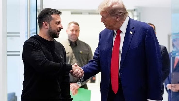 President Donald Trump and Ukraine's President Volodymyr Zelenskyy shake hands
