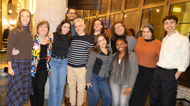 Council staff posing for a photo at an event.
