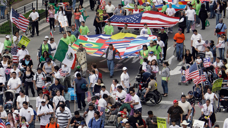 People participate in a pro-immigration protest