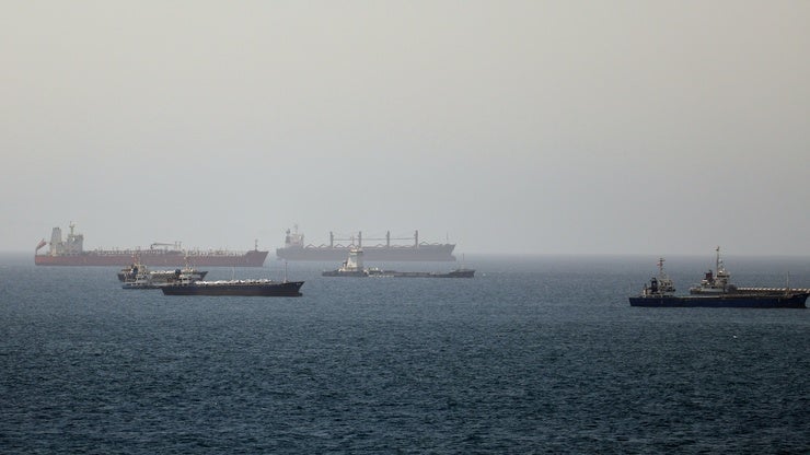Tankers and cargo vessels are seen in the Gulf of Oman, along shipping routes linking the Strait of Hormuz and the Arabian Sea, Tuesday, June 16, 2026.