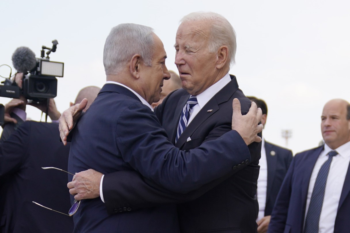 President Joe Biden is greeted by Israeli Prime Minister Benjamin Netanyahu after arriving at Ben Gurion International Airport, Wednesday, Oct. 18, 2023, in Tel Aviv.