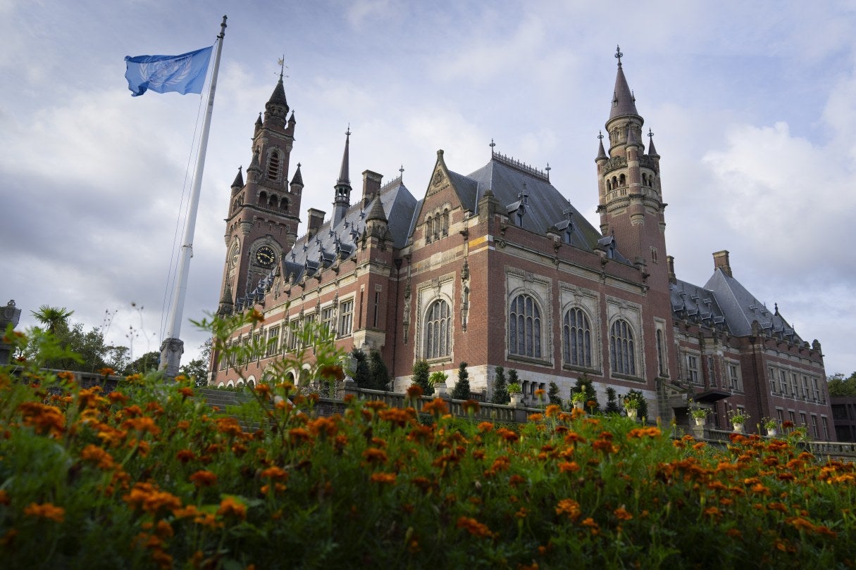 Building with a flag in front 