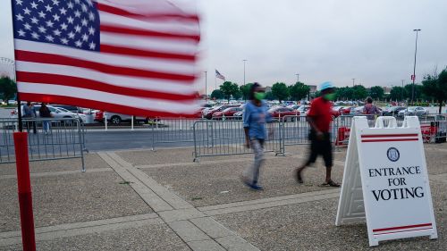 People vote during the 2020 primary in Louisville, Kentucky