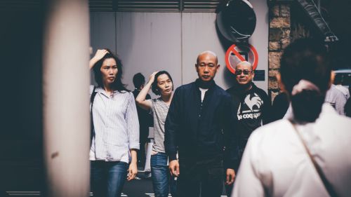 People walk outside the police headquarters in Hong Kong