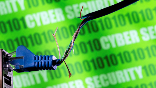 Broken Ethernet cable in front of green binary code and words "cyber security"