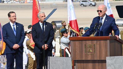 President Joe Biden speaks at a podium while visiting Jerusalem