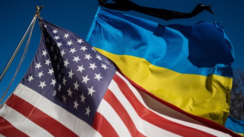 American and Ukrainian flags fly side by side