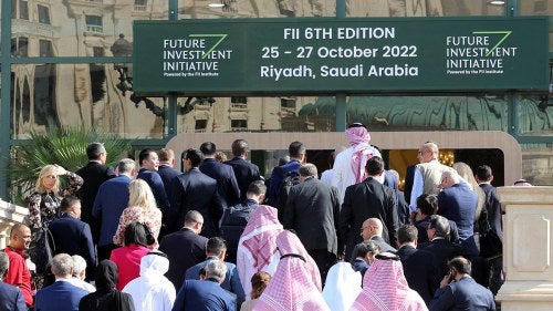 Participants arrive at the Future Investment Initiative (FII) conference in Riyadh, Saudi Arabia