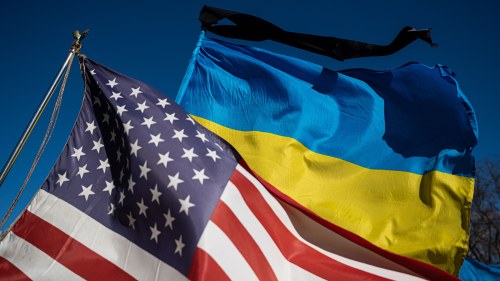 American and Ukrainian flags fly side by side
