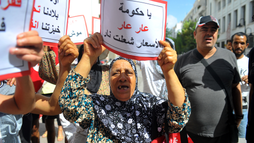 Supporters of the Free Constitutional Party demonstrate against the high cost of living and the lack of basic foodstuffs such as milk and bread in the capital at front of the Tunis governorate headquarters in Tunis, Tunisia.