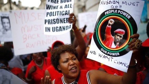 Protesters demonstrate against Ugandan President Yoweri Museveni outside Uganda House in London