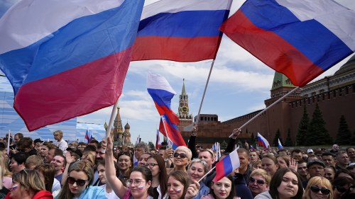 People wave Russian flags