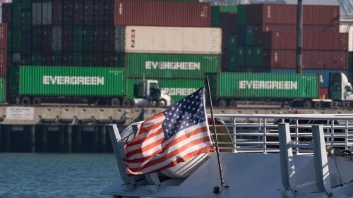 Shipping containers are seen stacked on the Evergreen terminal at the Port of Los Angeles