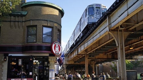 A Chicago Transit Authority train passes overhead near W Roscoe and Clark Streets