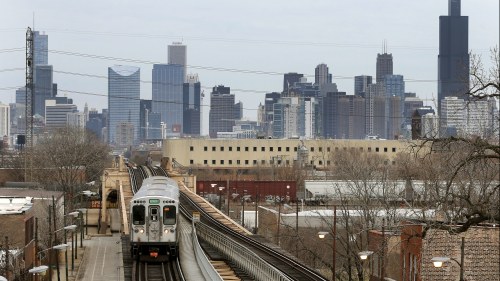 CTA Green Line train travels west from Chicago