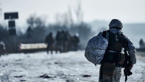 Ukrainian soldiers go to their position in the frontline close to Bakhmut