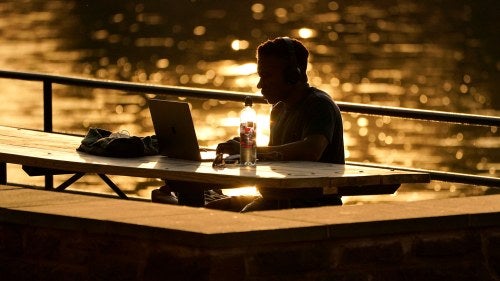A remote worker at Lake Roland in Maryland.