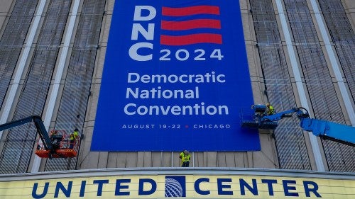 A banner for the DNC 2024 outside of  the United Center entrance