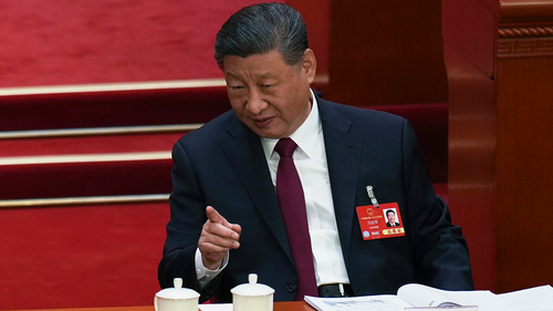 Chinese President Xi Jinping gestures during the opening session of the National People's Congress at the Great Hall of the People in Beijing, China on March 5, 2025.