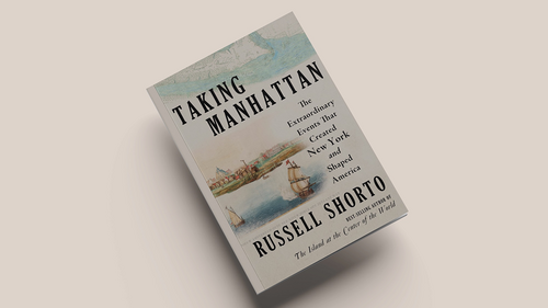 Russell Shorto's book "Taking Manhattan" over an alabaster background.