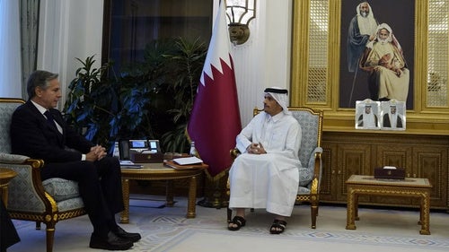 Qatar's Prime Minister and Foreign Minister Mohammed bin Abdulrahman Al Thani, right, and U.S. Secretary of State Antony Blinken, attend a meeting
