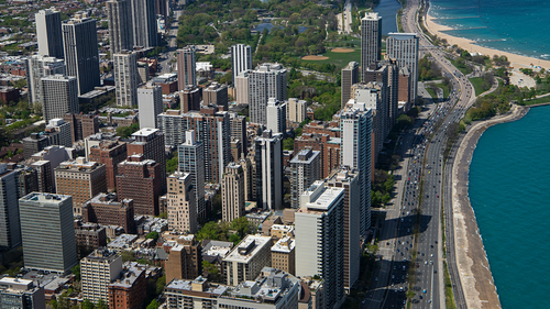 An aerial view of Lake Shore Drive and Chicago's skyline heading north towards Lincoln Park.