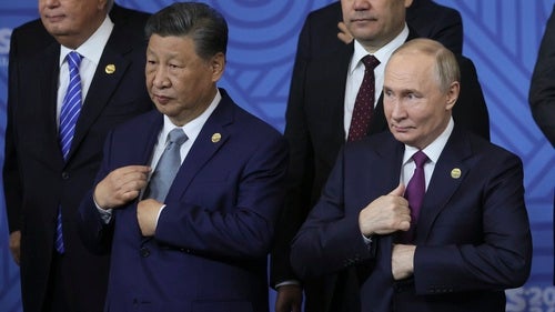 Chinese President Xi Jinping and Russian President Vladimir Putin at a BRICS summit
