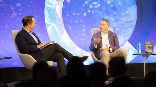 Alexander Vindman and John Gans on the Council's stage.