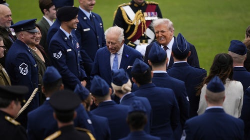 Britain's King Charles III and President Donald Trump speak to military personnel at Windsor Castle, England, on September 17, 2025.