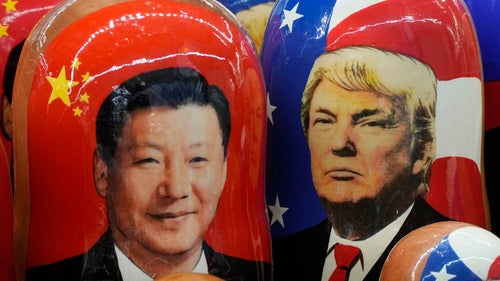 Wooden dolls depicting China's President Xi Jinping and US President Donald Trump