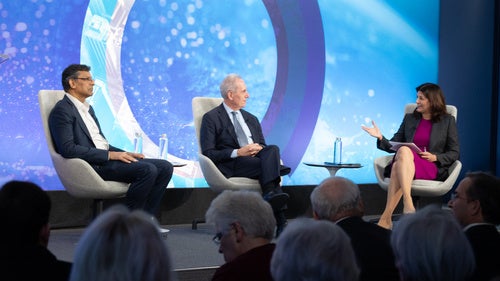 Speakers seated on the Council's stage